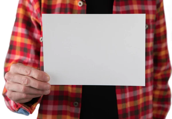 A man holding white letterhead — Stock Photo, Image