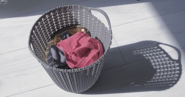 Dirty Cloth Falls Laundry Basket — Stock Video