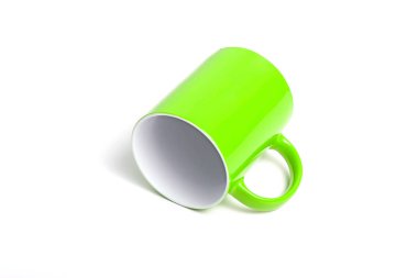 Yeşil ve beyaz kahve fincanı 