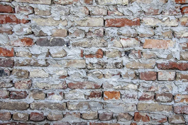 Una textura de pared de ladrillo grueso —  Fotos de Stock