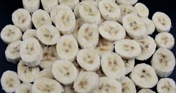 スライスしたバナナの回転 — ストック動画