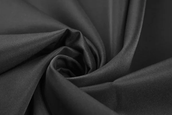 Elegant black satin silk with waves — Stock Photo, Image