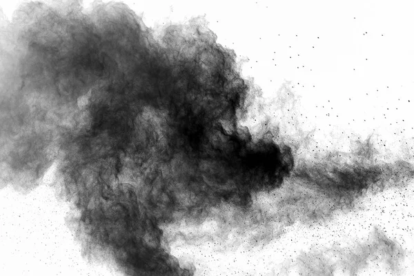 Explosion of black powder on white background.