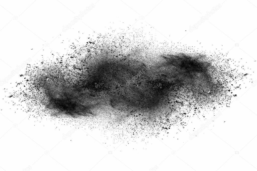 Explosion of black powder on white background.