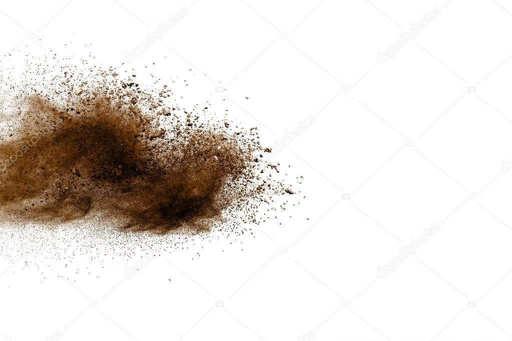 Explosive powder brown on white background. Dry soil explosion on white background