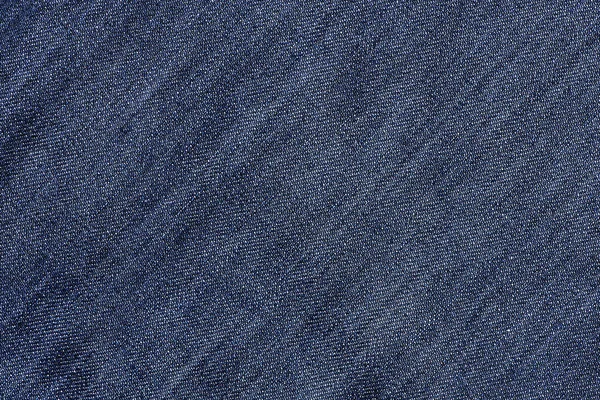 Blue jeans texture background. Jeans texture vintage background. Close-up blue jeans background and texture.