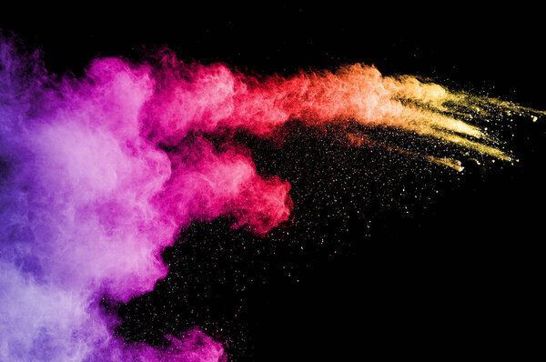 Взрыв разноцветной пыли на черном фоне
.