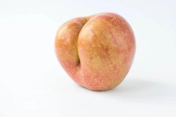 苹果看起来像一个人的屁股 — 图库照片
