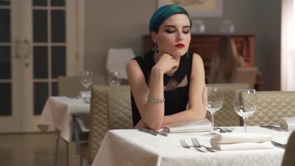 Beautiful Sad Woman Short Blue Hair Sitting Alone Restaurant Waiting — Stock Video