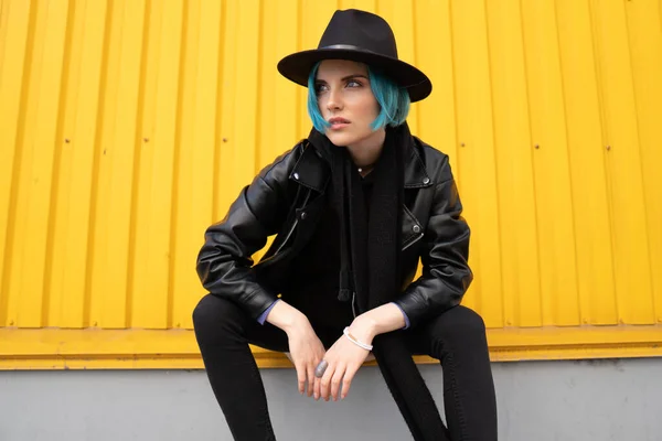 Young Woman Blue Hair Black Leather Jacket Hat Sits Orange Stock Image