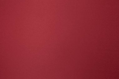 Tekstil dokusu arka planına sahip kırmızı kumaşın yakın plan görüntüsü