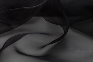 Tekstil dokusu arka plan ile siyah ipek kumaş güzel yakın yukarı