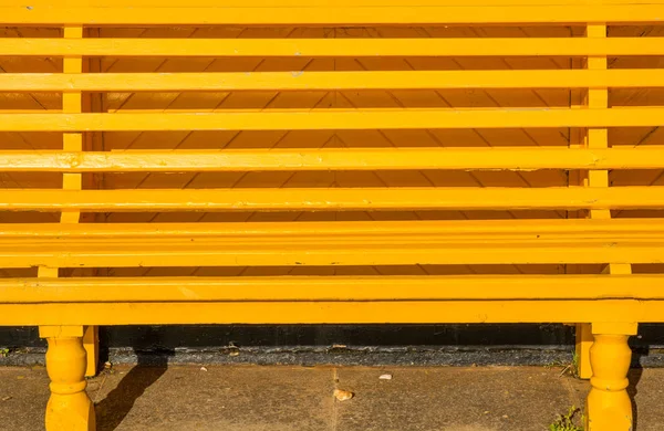 Yellow Painted Wooden Slatted Bench Seat Seafront Promenade Southsea Portsmouth — Stock Photo, Image