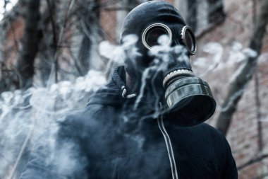 afet arka planı Gaz Maskeli adam. kirlilik kavramı