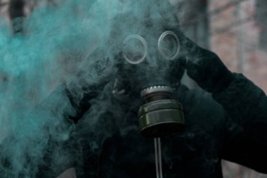 afet arka planı Gaz Maskeli adam. kirlilik kavramı
