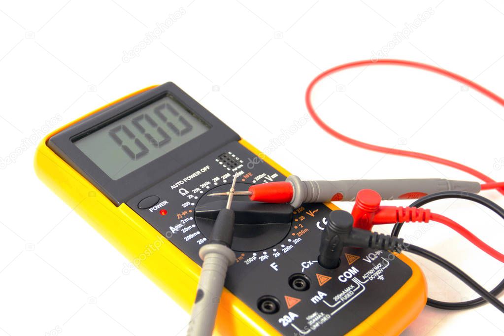Digital multimeter with red and black probe, display indicating zero. Isolated on a white background with a clipping path. Close-up view