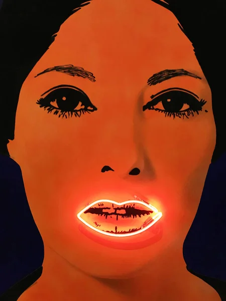Face of woman with highlighted lips. Exposition at Modern Art Museum in Stockholm, Sweden