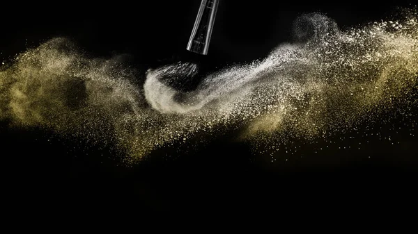 Cosmetic brush with gold cosmetic powder spreading for makeup ar — Stock Photo, Image