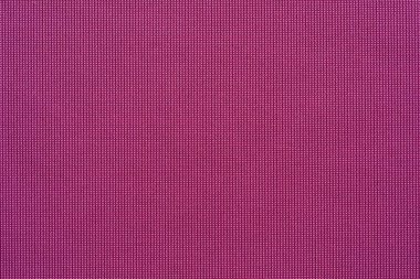 Oluklu makro doku kumaş veya tekstil malzeme kızıl kırmızı renkli bir arka plan veya duvar kağıdı