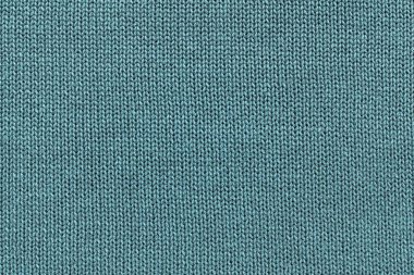 soluk mavi renk veya Triko closeup kumaş örme doku arka plan