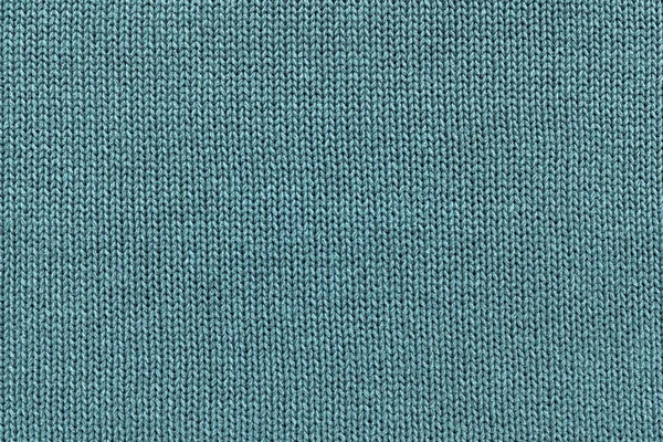 soluk mavi renk veya Triko closeup kumaş örme doku arka plan