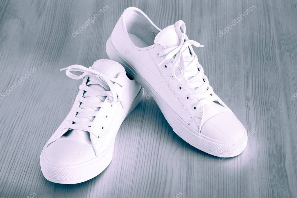 fashionable and beautiful footwear of white color closeup for sports activities or for comfortably to go