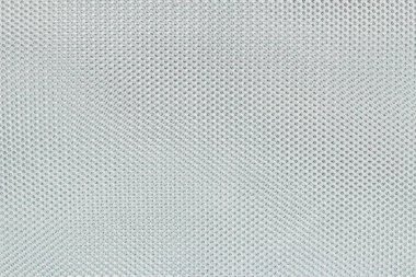 Açık soyut soluk renkli ve taneli benekli desenli kumaş dokusuna taklit ile duvar kağıdı