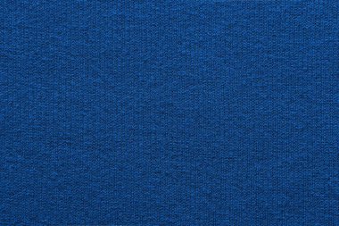 boşalt ve arka plan veya kumaş veya tekstil malzemenin soyut örme tekstürlü duvar kağıdı mavi renk bir closeup temizle