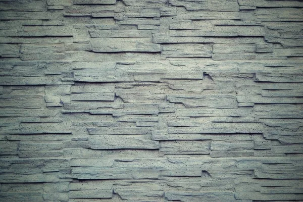 Golfkartonnen textuur van een stenen muur in vintage stijl — Stockfoto