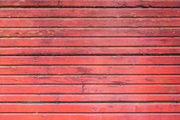 Textured background of the old painted boards of red color — Stock Photo, Image