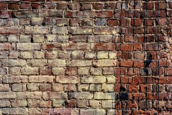 Oude bakstenen muur in stijl grunge — Stockfoto