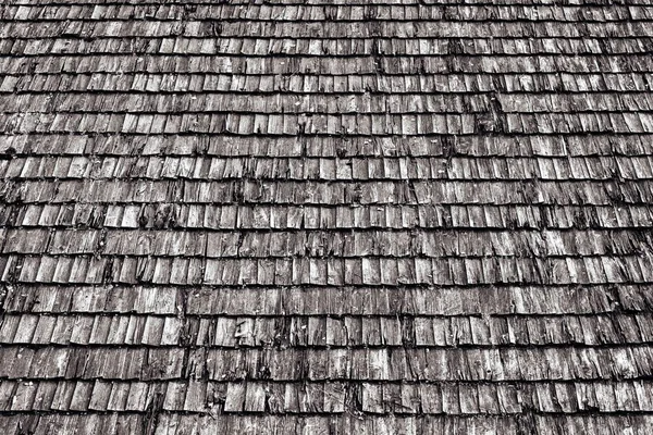 Texture of old wooden spill or wooden tile on a roof for a background — Stock Photo, Image