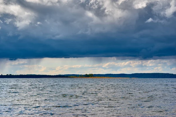 Thunderstorm landscape on lake or river — Stock Photo, Image