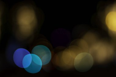 Soyut şehir ışık Bokeh renkli arka plan.