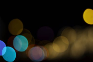 Soyut şehir ışık Bokeh renkli arka plan.