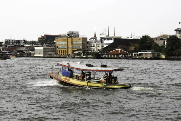 Passenger boats are running in the Chao Phraya River.