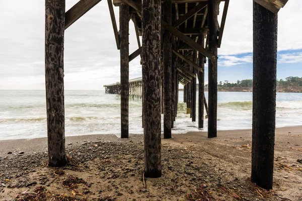 The poles under the pier of San Simeon, California, USA — Stock Photo, Image