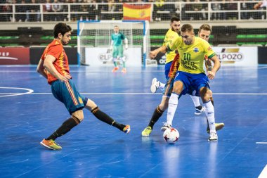 Indoor footsal match of national teams of Spain and Brazil at the Multiusos Pavilion of Caceres clipart
