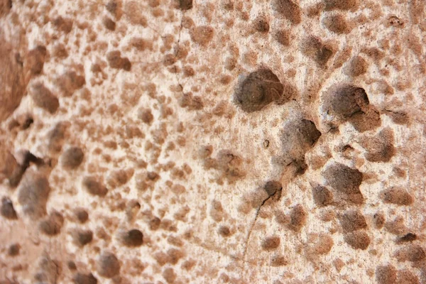 Barna kő vagy mwith repedések és patternsarble fal egy textúra — Stock Fotó
