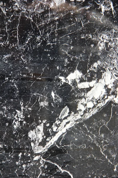 Текстура чорного мармуру або плитки з білими плямами і візерунками — стокове фото