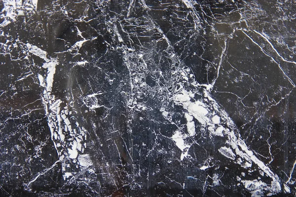 Texture of black a marble or tile with white stains and patterns Stock Photo