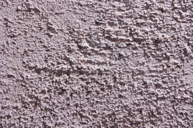 çatlak ve lekeleri ile eski bir duvarın pürüzlü pembe yüzey