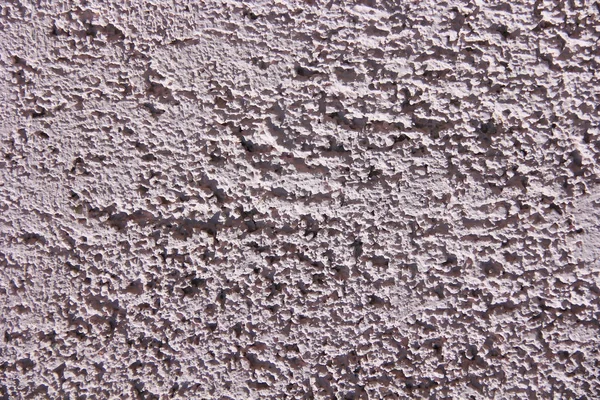 Rough pink surface of old a wall with cracks and stains — Stock Photo, Image