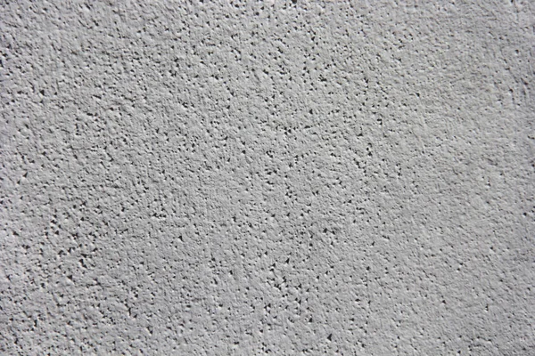 A régi fal repedéseket, mintákat és foltokat tartalmazó durva felületének textúrája — Stock Fotó