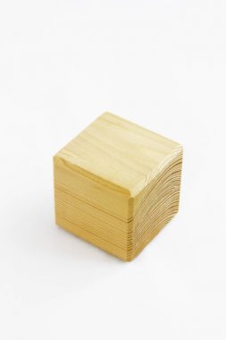 wooden decorative cube with patterns of divorces on white background