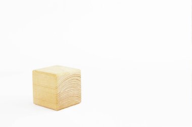 wooden decorative cube with patterns of divorces on white background