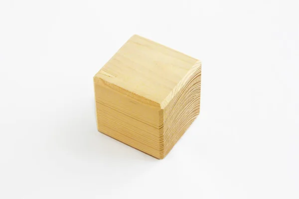 Wooden decorative cube with patterns of divorces on white background — Stock Photo, Image