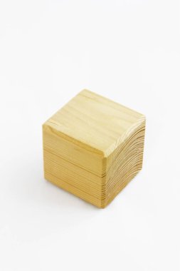 wooden decorative cube with patterns of divorces on white background