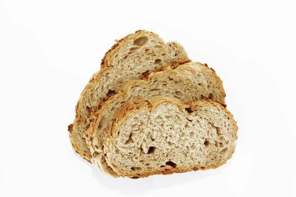 Pieces of rye bread with seeds on white background — Stock Photo, Image