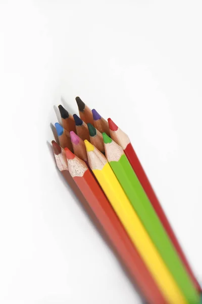 Colorful wooden pencils for drawing on white background — Stock Photo, Image